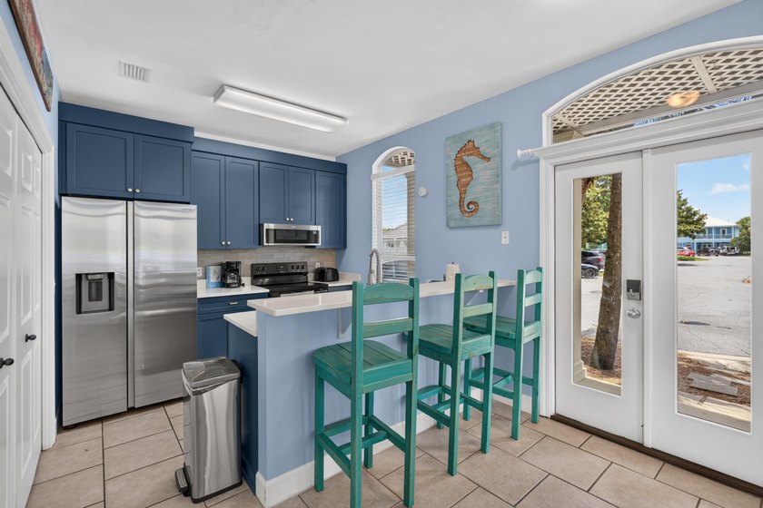 Discover coastal living just steps from the sugar-white sands of - photo 2