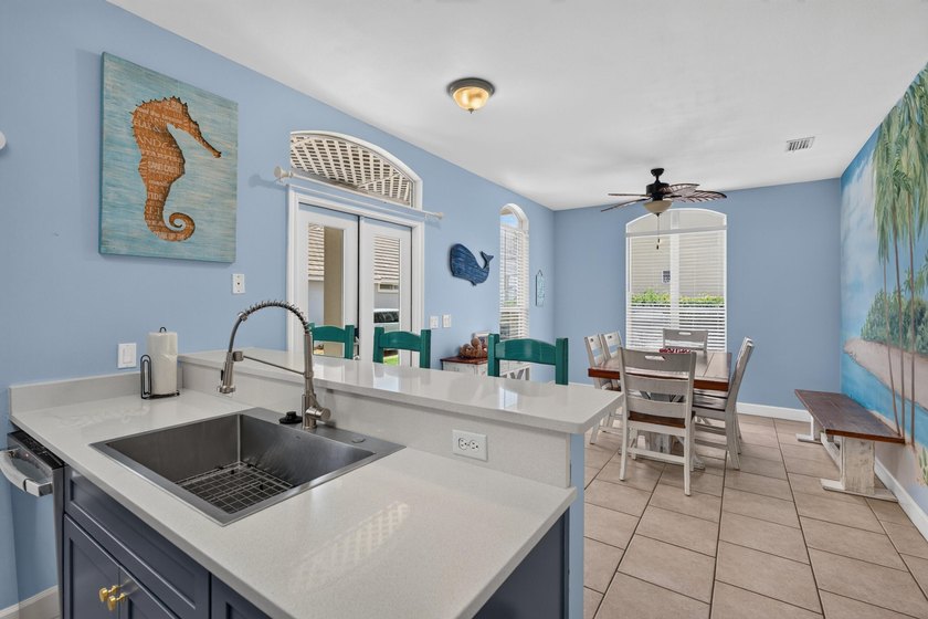 Discover coastal living just steps from the sugar-white sands of - photo 5