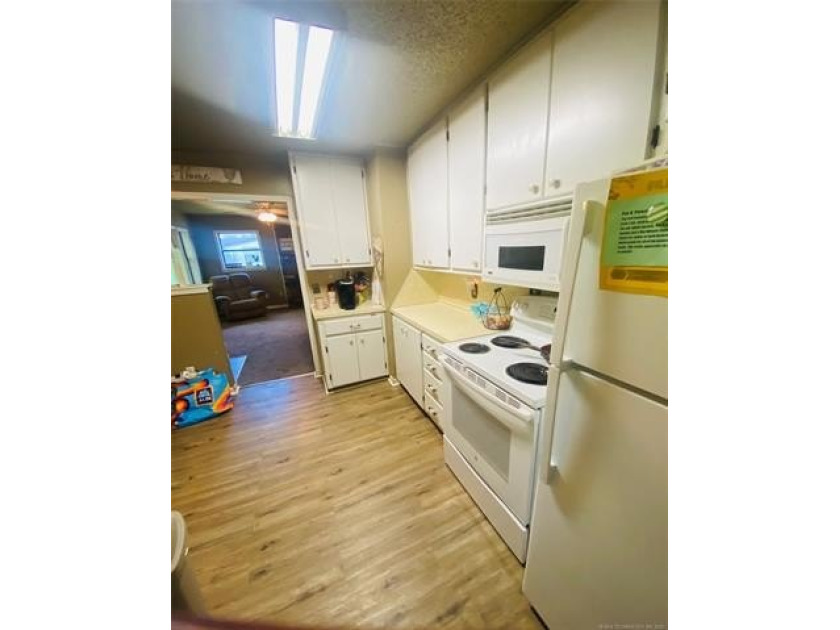 Located in Cleveland, Oklahoma, this charming residence is - photo 11