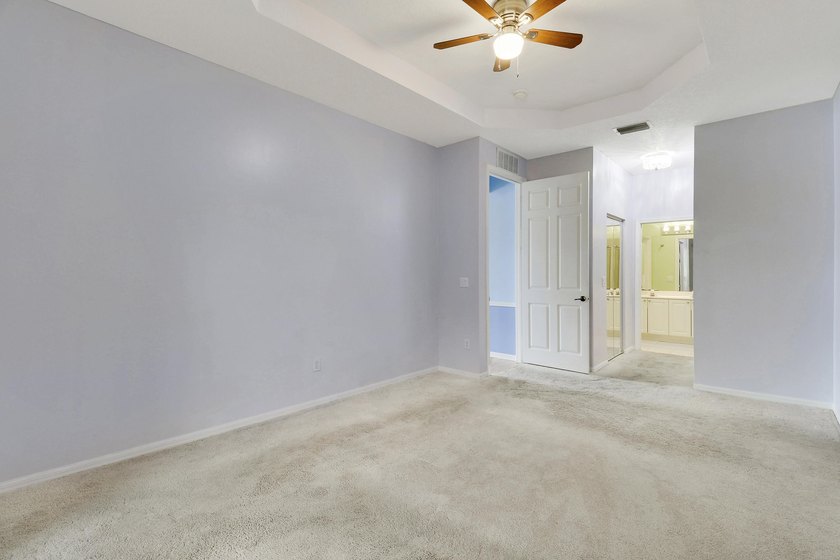 This spacious end-unit home is vacant and move-in ready! Tucked - photo 3