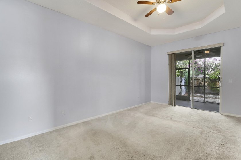 This spacious end-unit home is vacant and move-in ready! Tucked - photo 4