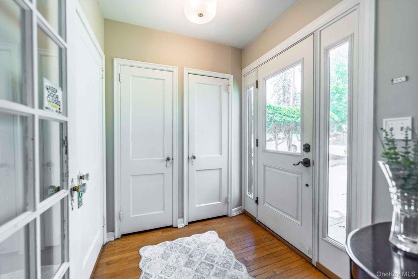 Picture-perfect 3-bedroom, 1.5-bath Tudor set on a tree-lined - photo 5
