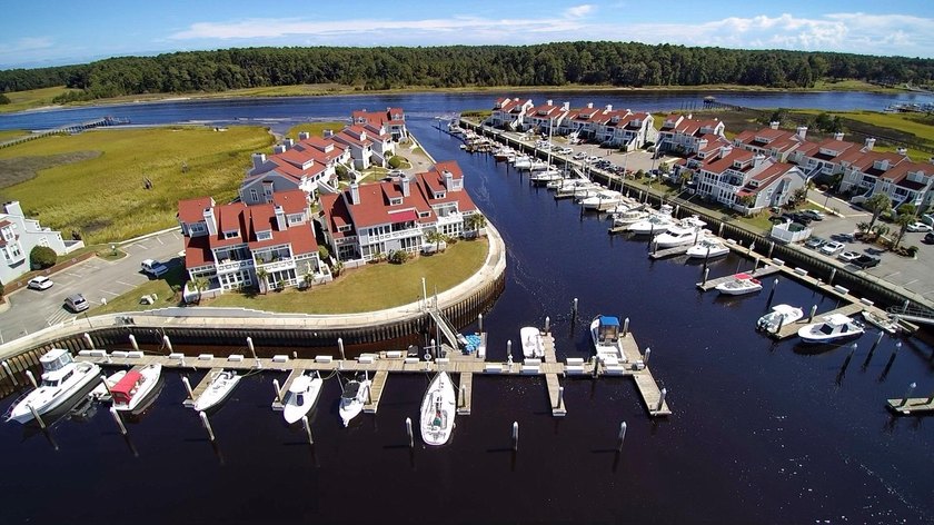 Deeded 30' boat slip in the charming Nantucket style community - photo 16