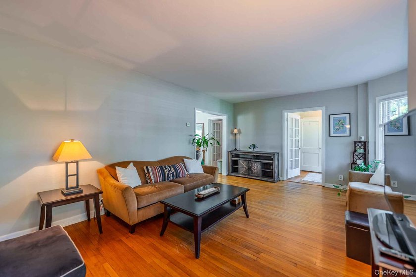 Picture-perfect 3-bedroom, 1.5-bath Tudor set on a tree-lined - photo 6