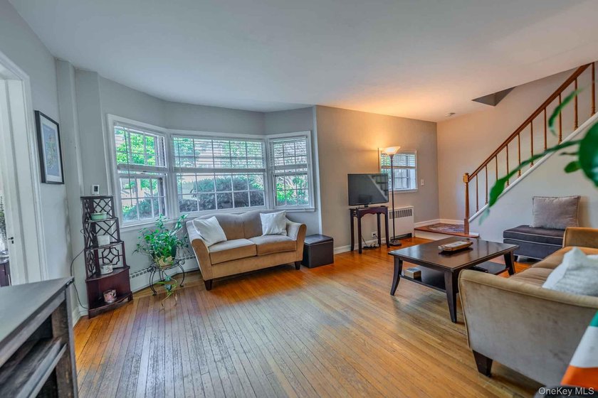 Picture-perfect 3-bedroom, 1.5-bath Tudor set on a tree-lined - photo 8