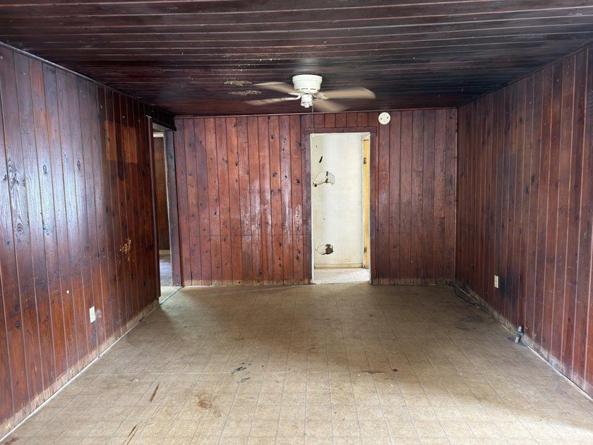 Welcome to your next REO opportunity! Built in 1970, this corner - photo 2