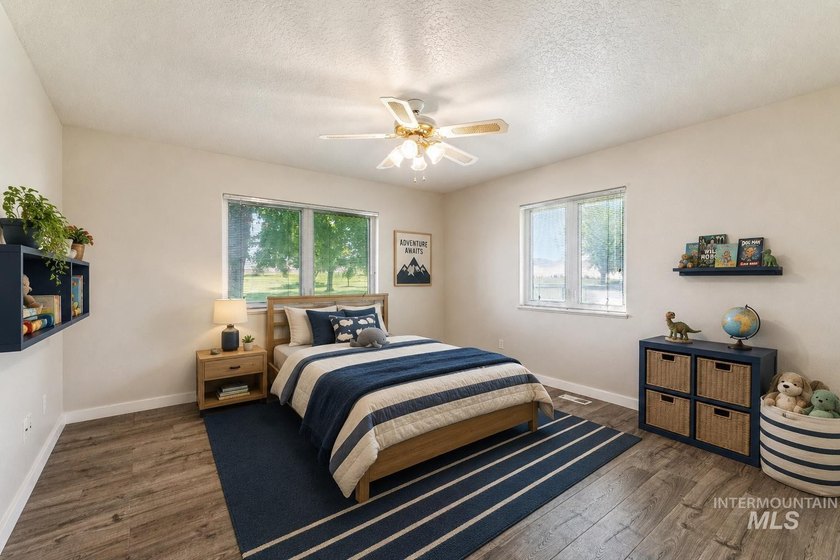 Tucked away in a peaceful country setting on 1.09 acres, you'll - photo 25