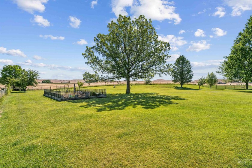 Tucked away in a peaceful country setting on 1.09 acres, you'll - photo 41