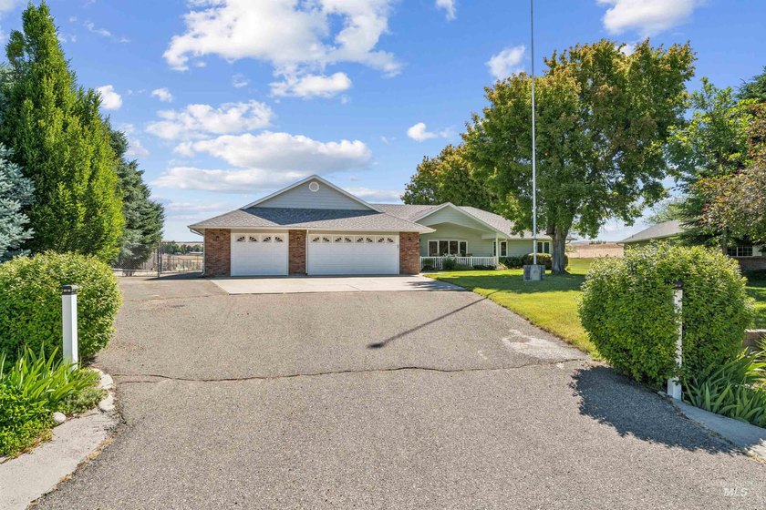 Tucked away in a peaceful country setting on 1.09 acres, you'll - photo 50
