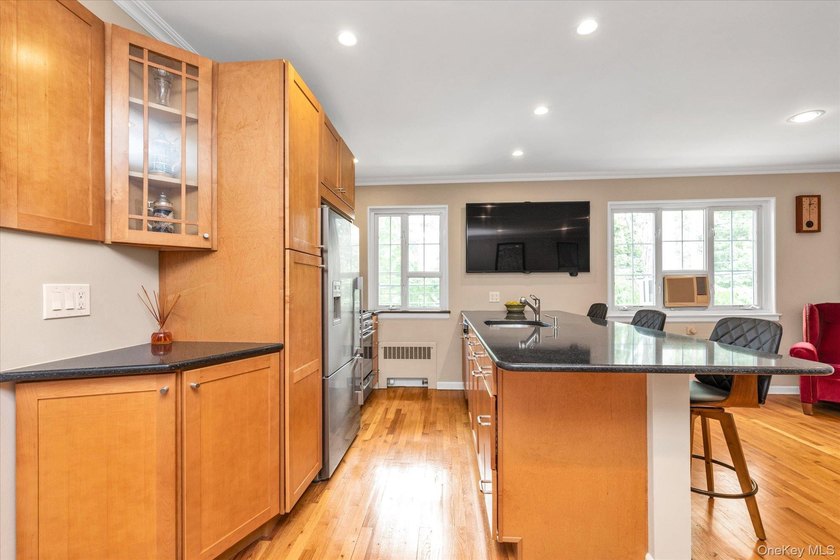 Unparalleled, custom-designed one-bedroom, second floor unit in - photo 2