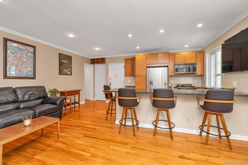 Unparalleled, custom-designed one-bedroom, second floor unit in - photo 3