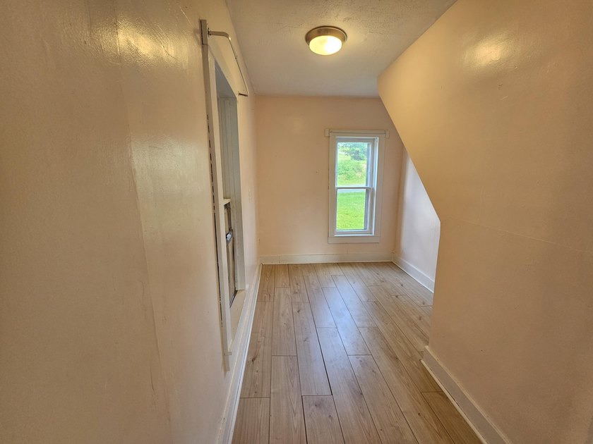 Here is a great investment opportunity on a spacious corner lot - photo 14