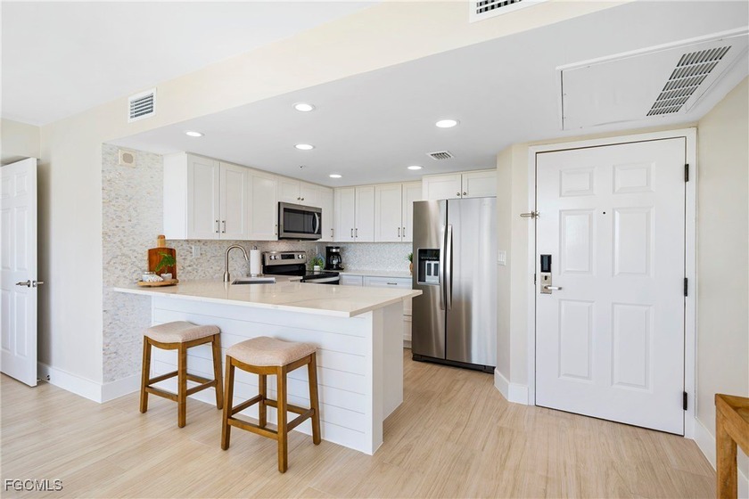 Indulge in elevated coastal living from this exclusive - photo 8