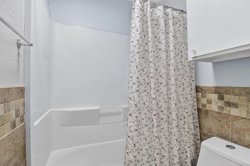 Pretty end unit offering extra privacy. Overlooks the old - photo 15