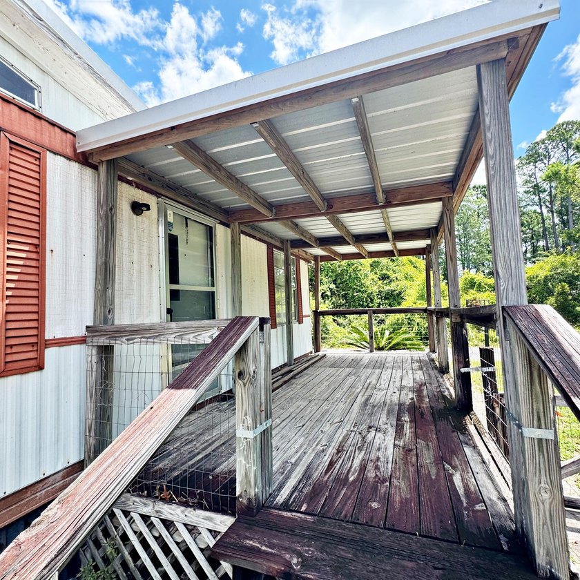 Investor, cash buyer, or renovation opportunity in Navarre! - photo 2