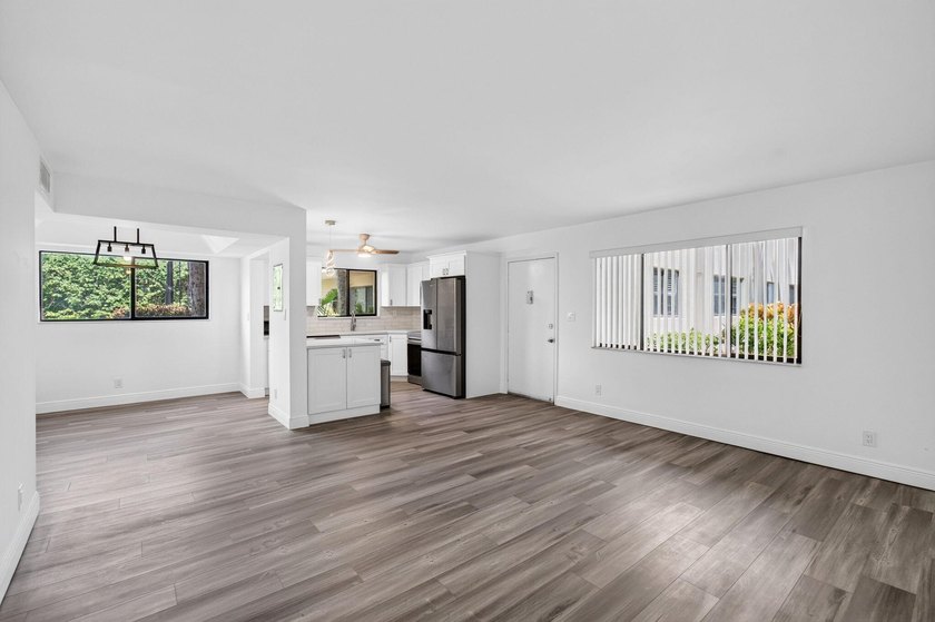 Welcome to easy living in the highly sought-after 55+ community - photo 11