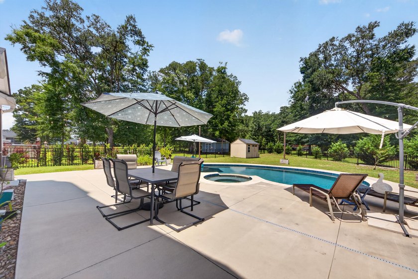 Vacation living, every day. Set on a nearly half-acre corner lot - photo 50