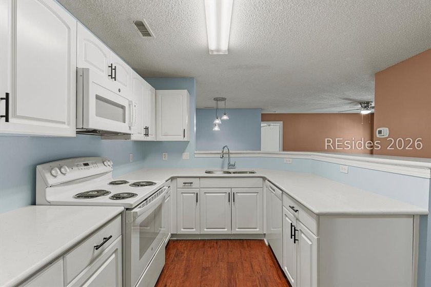 Enjoy easy Bluffton living in this 2BR/2BA condo located in the - photo 7
