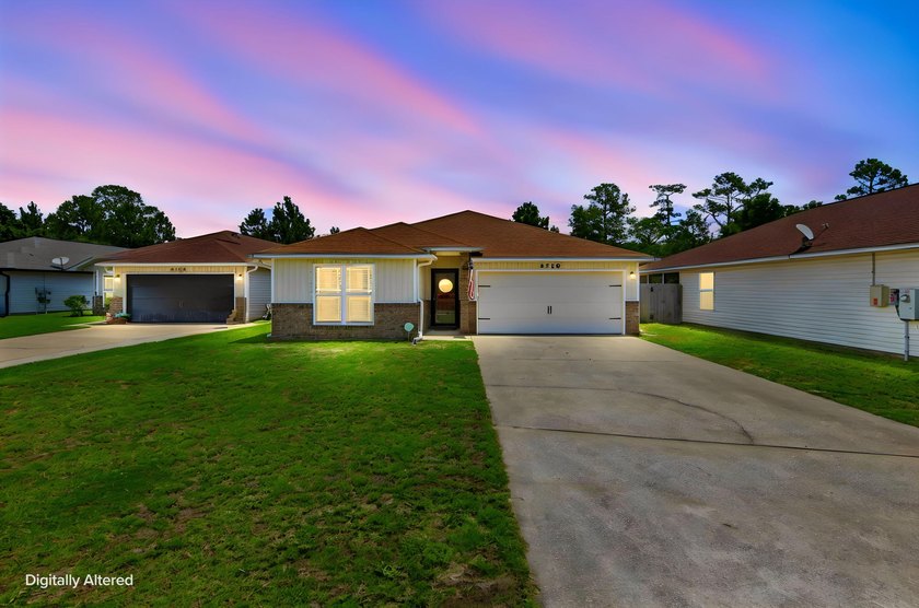 Located in the Duncan Ridge community of Navarre, this 3-bedroom - photo 3
