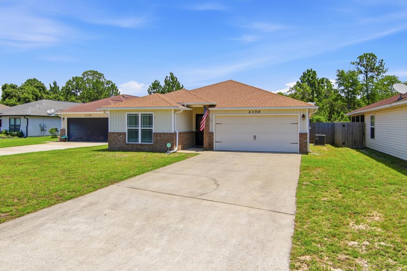 Located in the Duncan Ridge community of Navarre, this 3-bedroom - photo 4