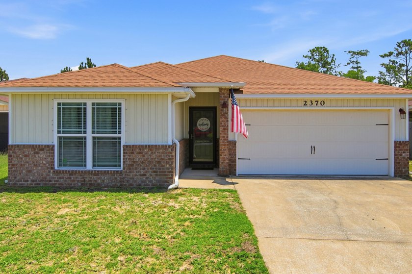 Located in the Duncan Ridge community of Navarre, this 3-bedroom - photo 6