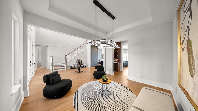 This never-lived-in luxury residence presents an extraordinary - photo 7