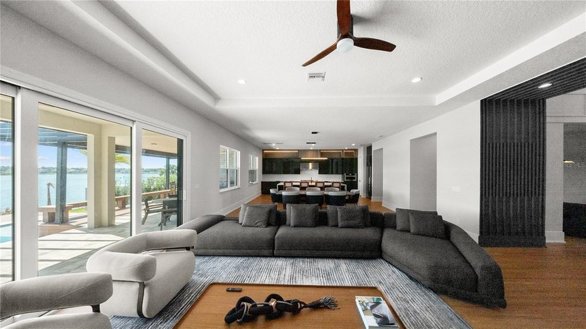 This never-lived-in luxury residence presents an extraordinary - photo 9