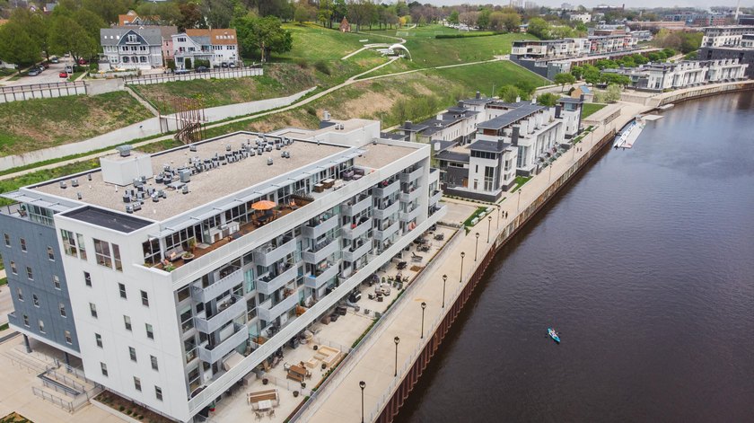 River and skyline views set the tone from your private balcony - photo 14
