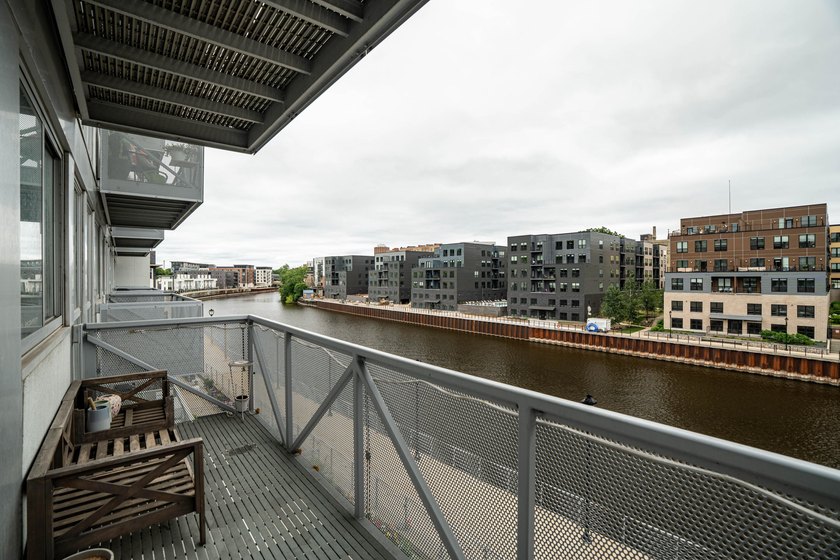 River and skyline views set the tone from your private balcony - photo 17