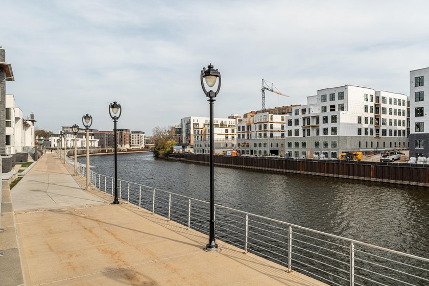 River and skyline views set the tone from your private balcony - photo 19