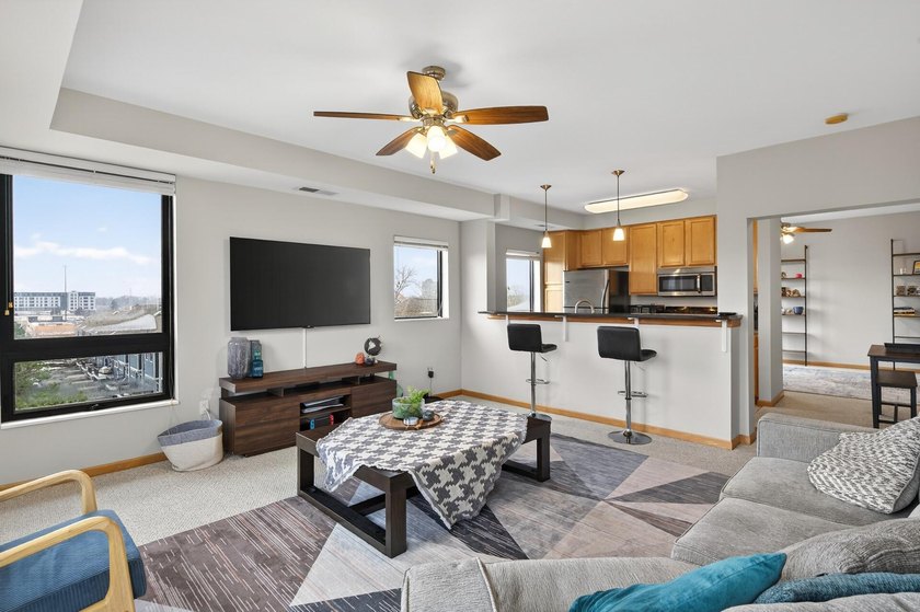 This is the one you've been waiting for! This rare corner unit - photo 6
