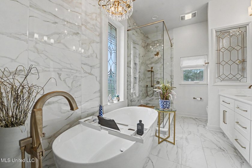 Welcome to this meticulously reimagined waterfront retreat in - photo 26