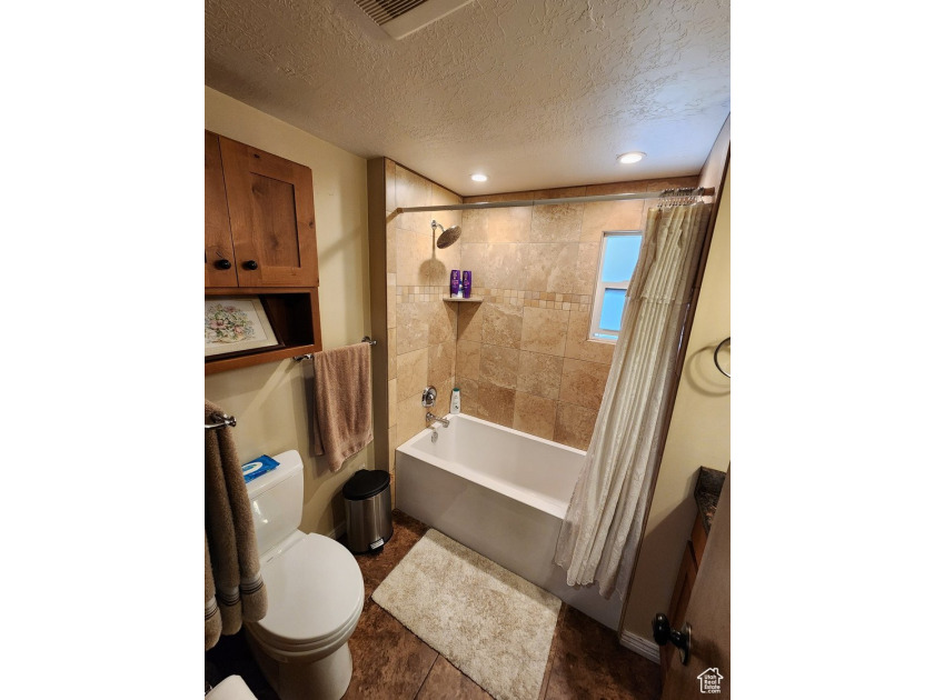 This home is set to impress! Pride in ownership can be seen in - photo 8