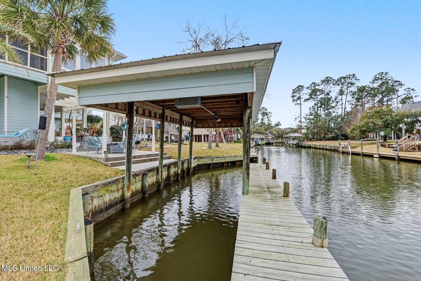 Welcome to this meticulously reimagined waterfront retreat in - photo 37