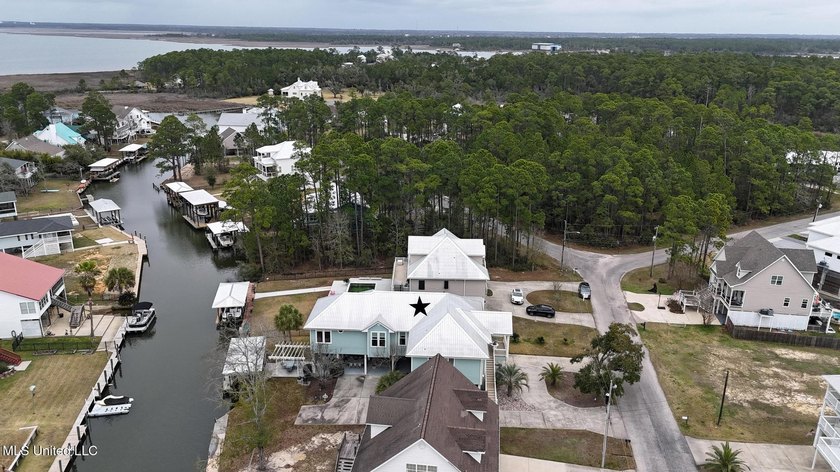 Welcome to this meticulously reimagined waterfront retreat in - photo 41