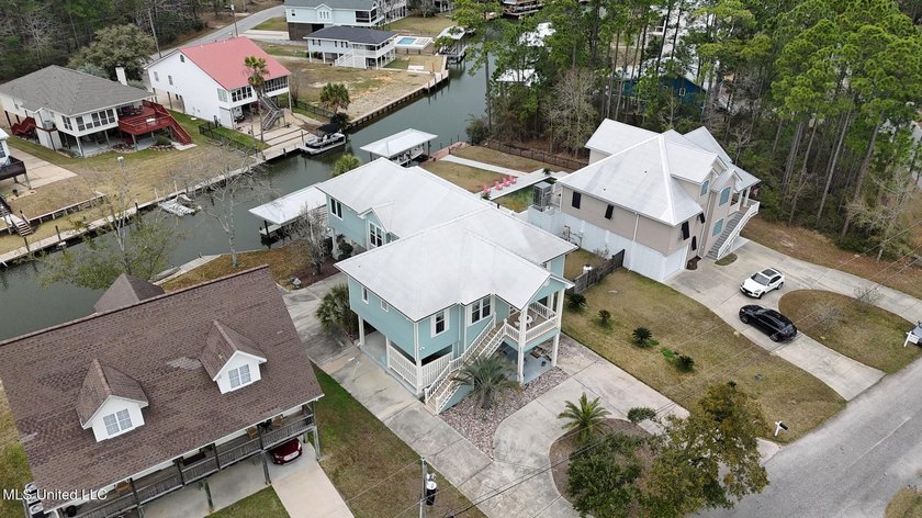 Welcome to this meticulously reimagined waterfront retreat in - photo 43