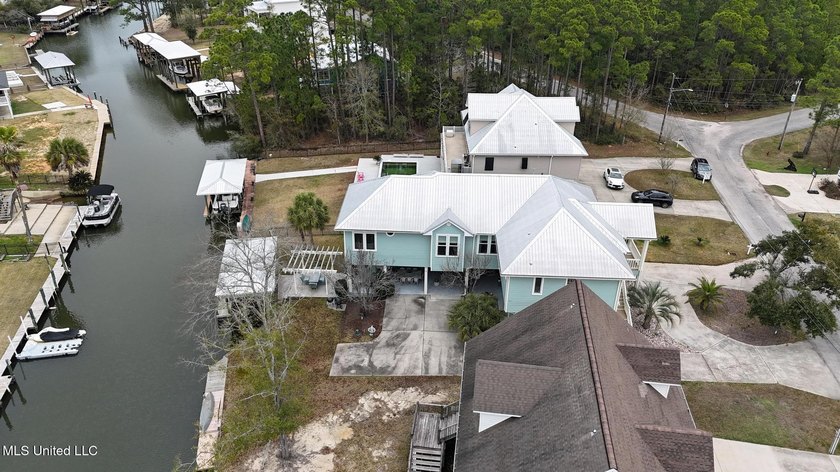 Welcome to this meticulously reimagined waterfront retreat in - photo 44