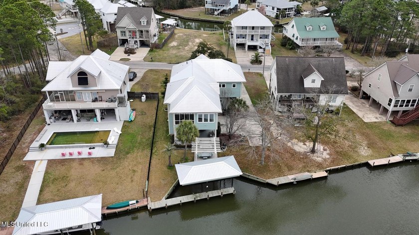Welcome to this meticulously reimagined waterfront retreat in - photo 46