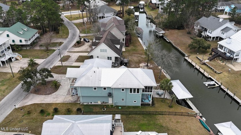 Welcome to this meticulously reimagined waterfront retreat in - photo 48