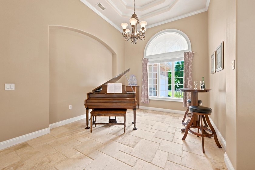 Nestled within the gated community of Soundside Shores, this - photo 8