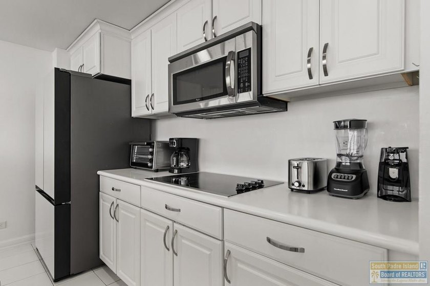 Beautifully updated townhome-style condo with stunning views of - photo 4