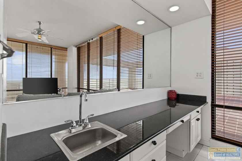 Beautifully updated townhome-style condo with stunning views of - photo 10