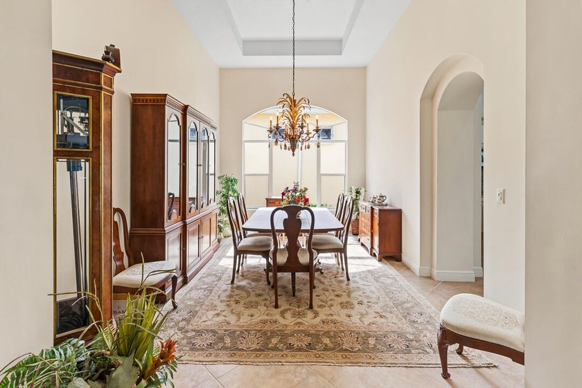 Discover luxury living in Palm Cove Golf &amp; Yacht Club in this - photo 11
