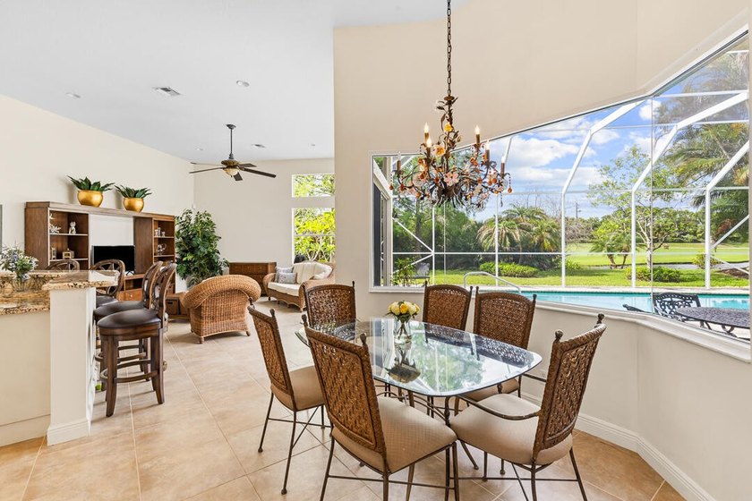 Discover luxury living in Palm Cove Golf &amp; Yacht Club in this - photo 15