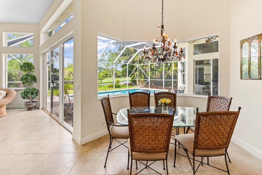 Discover luxury living in Palm Cove Golf &amp; Yacht Club in this - photo 21