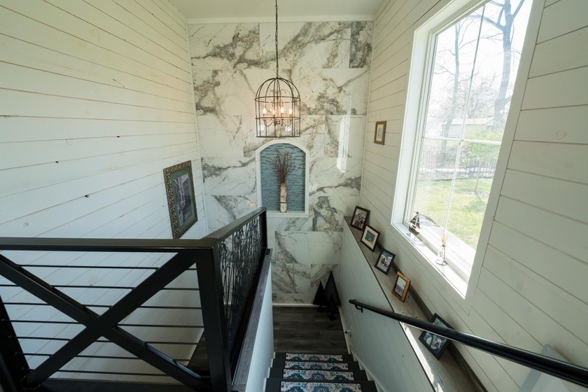 Stunning lake view luxury estate with dual living potential! - photo 32