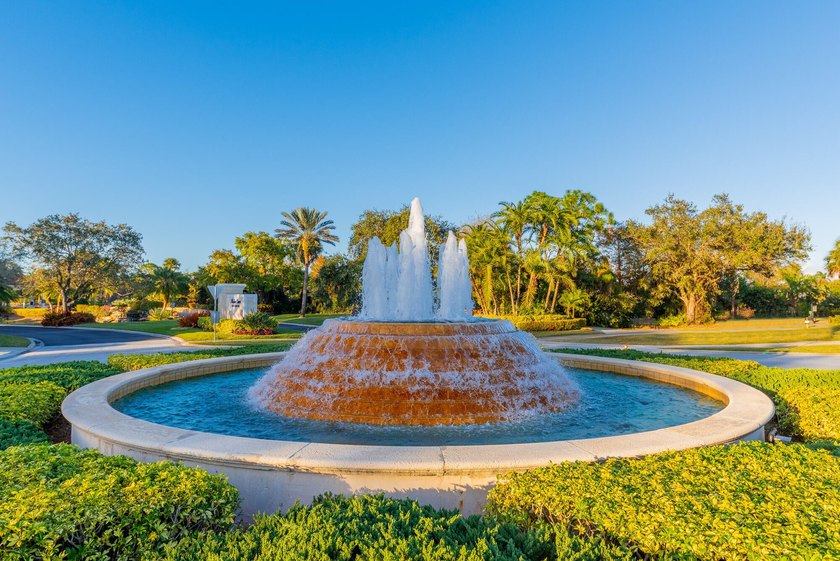 Discover luxury living in Palm Cove Golf &amp; Yacht Club in this - photo 42