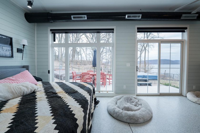 Stunning lake view luxury estate with dual living potential! - photo 45