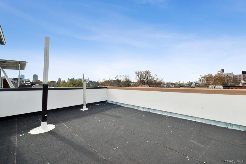PENTHOUSE PERFECTION WITH PRIVATE ROOFTOP TERRACE AND MANHATTAN - photo 10