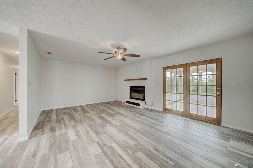 Welcome to 12302 Country Club Drive in the desirable Sandy Creek - photo 5